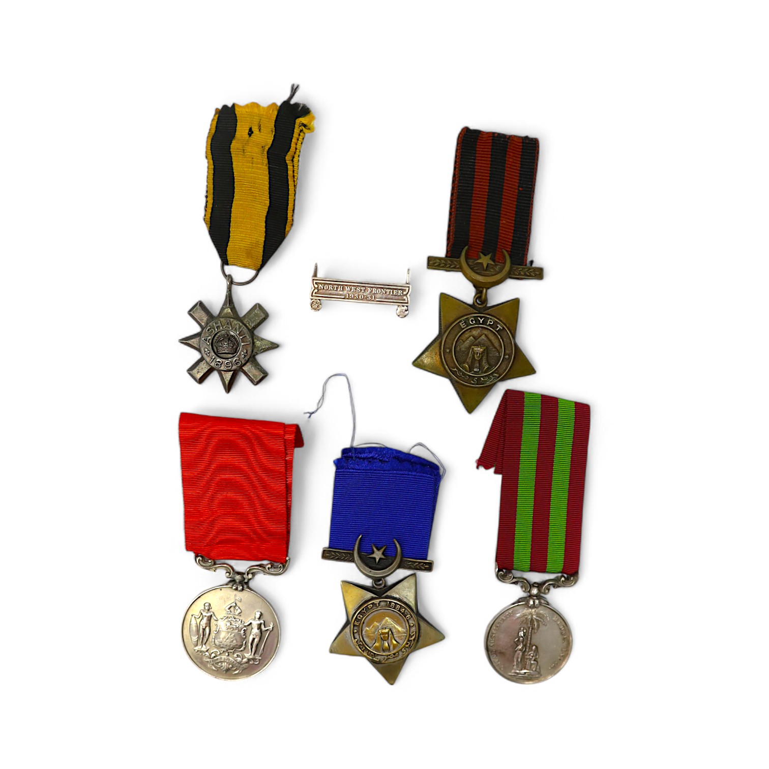 Replica medals; Khedive's Star 1884-6 and another undated; Ashanti star; Spink British North Borneo medal, a loose North West Frontier 1930-31 clasp and a Total Abstinence India medal 50-80